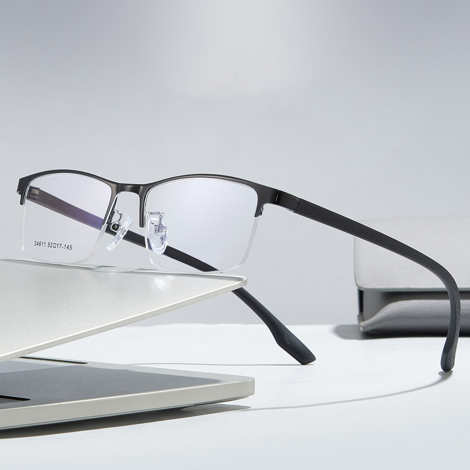 34611 Ochelari minimalisti din aliaj hipoalergenic cu jumătate de cadru